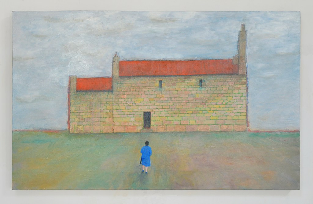 Woman in blue going to church